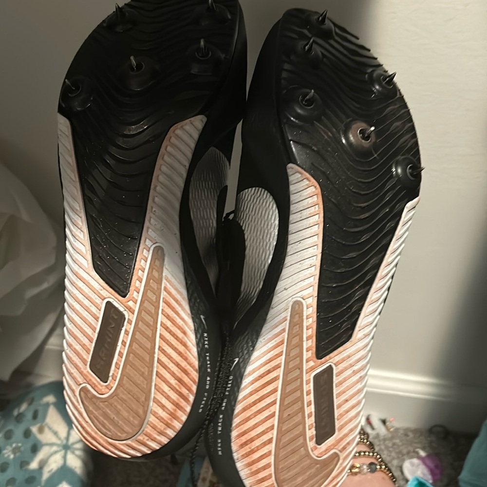 Nike black track shoes with spikes